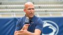 Penn State’s head football coach makes a guaranteed $7 million a year, but he doesn’t appear on the university’s required list of top 25 highest-salaried employees.