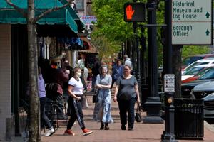 People gather outside a Starbucks in Beaver, Pa. Beaver County Commissioners have said they disagree with Gov. Tom Wolf and the county will act as if they are transitioning to the "yellow" phase on May 15.